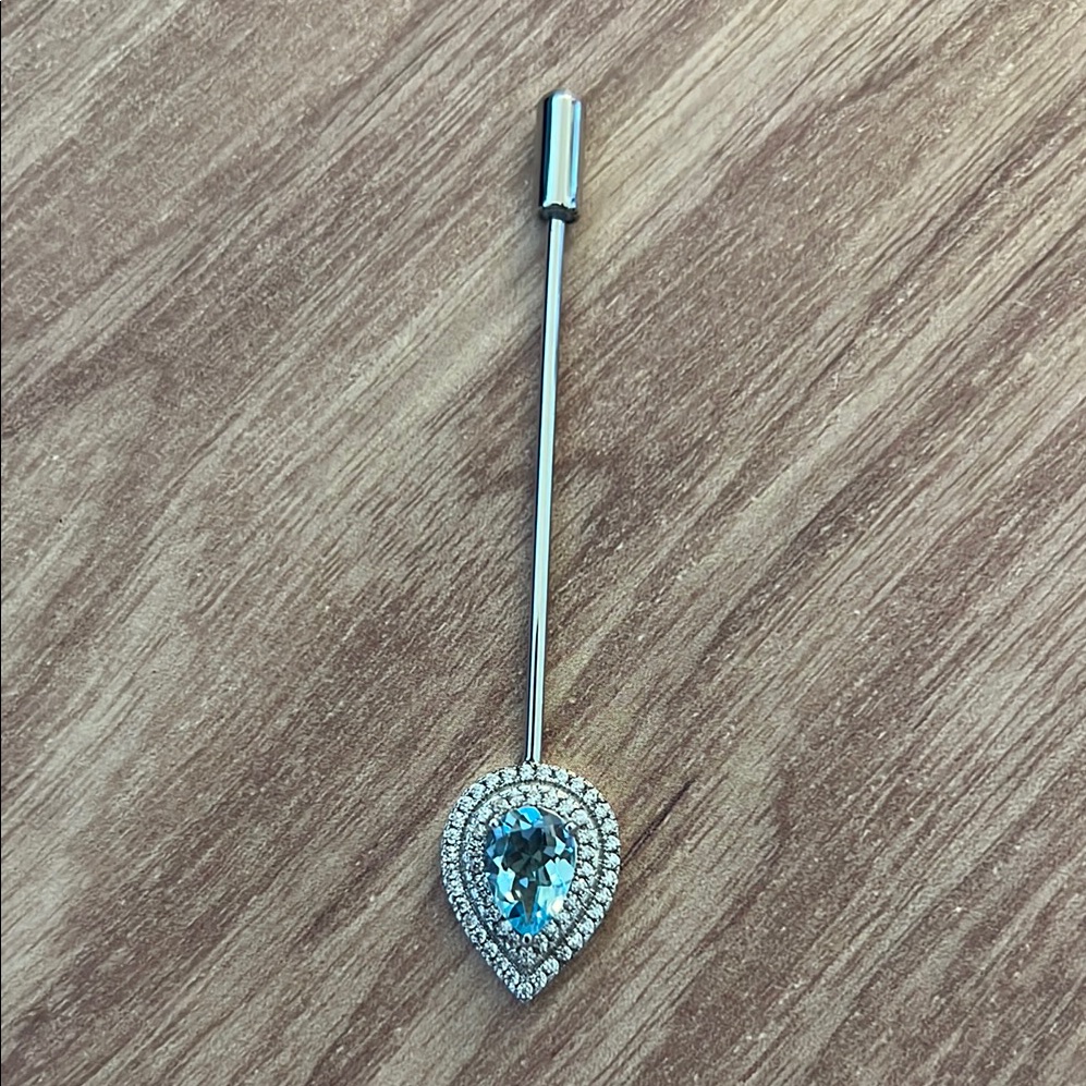 Elegant Silver Blue Topaz Brooch With Cz Accent